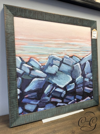 Blue Rocks On Shore Picture With Peach Sunset