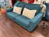Teal Blue Loveseat With Curved Silhouette Tufted Brown Flared Legs