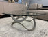 Limitless Glass Top Grey Micro Leather Curved Fluid Design Base Coffee Table