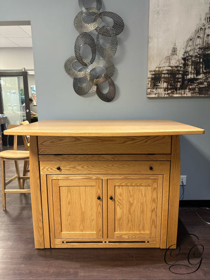 Oak Frontier Island Buffet With Pull Out Table 6 Leaves 2 Door Storage 52x36x42’’ Dining Table Only