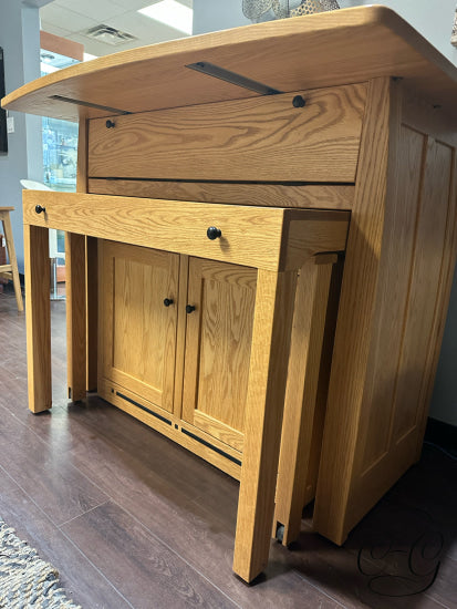 Oak Frontier Island Buffet With Pull Out Table 6 Leaves 2 Door Storage 52x36x42’’ Dining Table Only