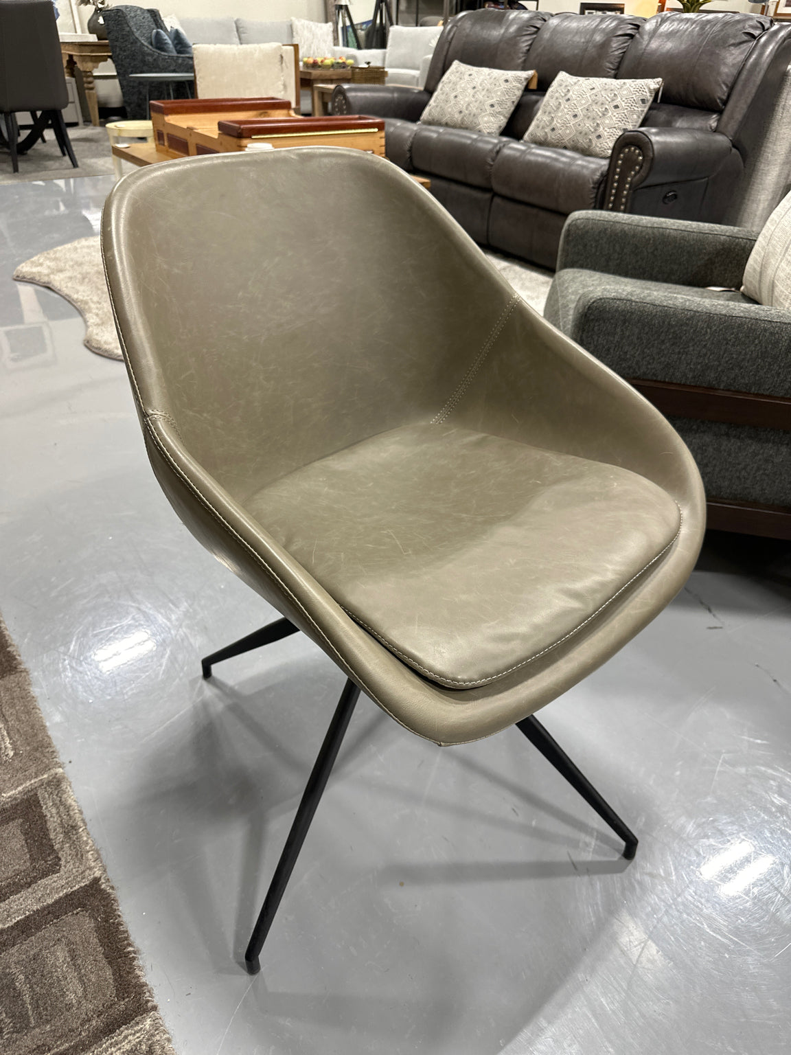 EQ3 Grey Synthetic Leather Swivel Dining Chair With Black Metal Base
